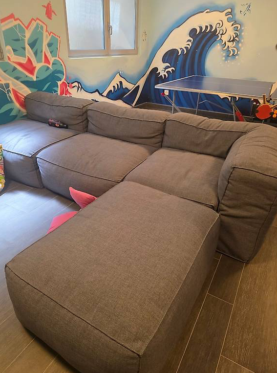 Grosses graues Ecksofa mit Recamiere